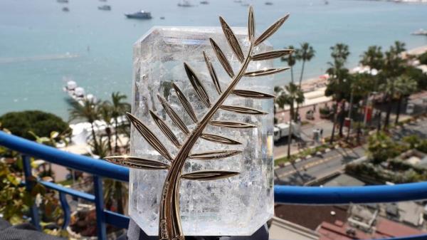This file photo taken on May 24, 2017 shows the Palme d'Or trophy inlaid with diamo<em></em>nds which celebrates the 70th edition of the Cannes Film Festival at the Grand Hyatt Cannes Hotel Martinez in Cannes, southern France. (AFP)