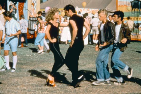 The cast of "Grease" during the final scenes